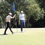 Chantha Kong and Corey Fawkes on the 8th green